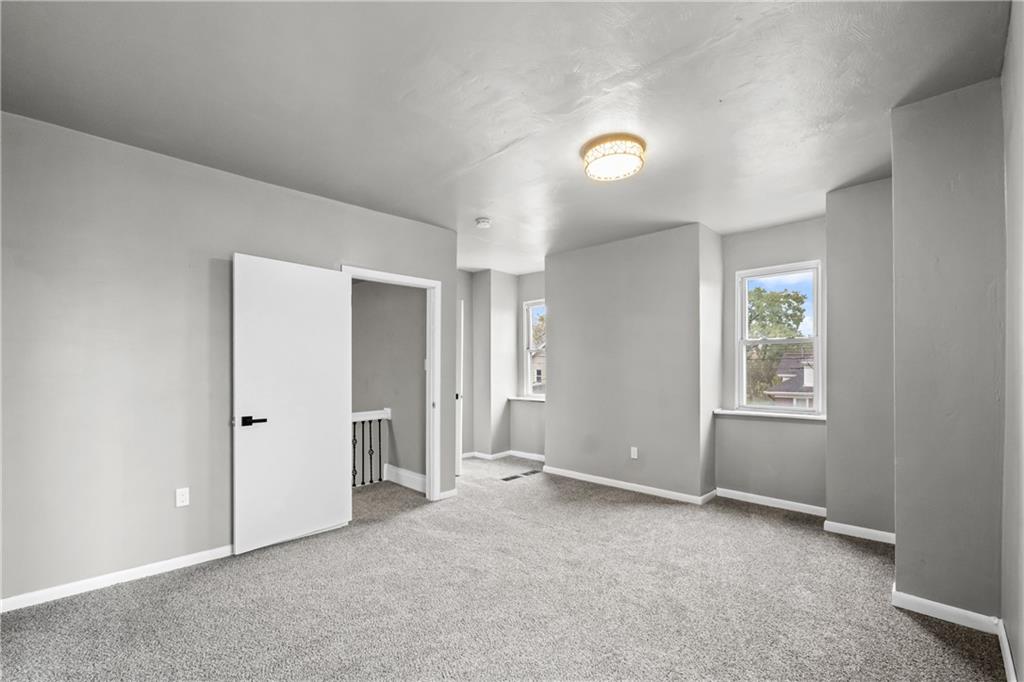 1256 Superior Avenue Pittsburgh, PA 15212 - Photo 48 of 50 an empty room with windows and closet