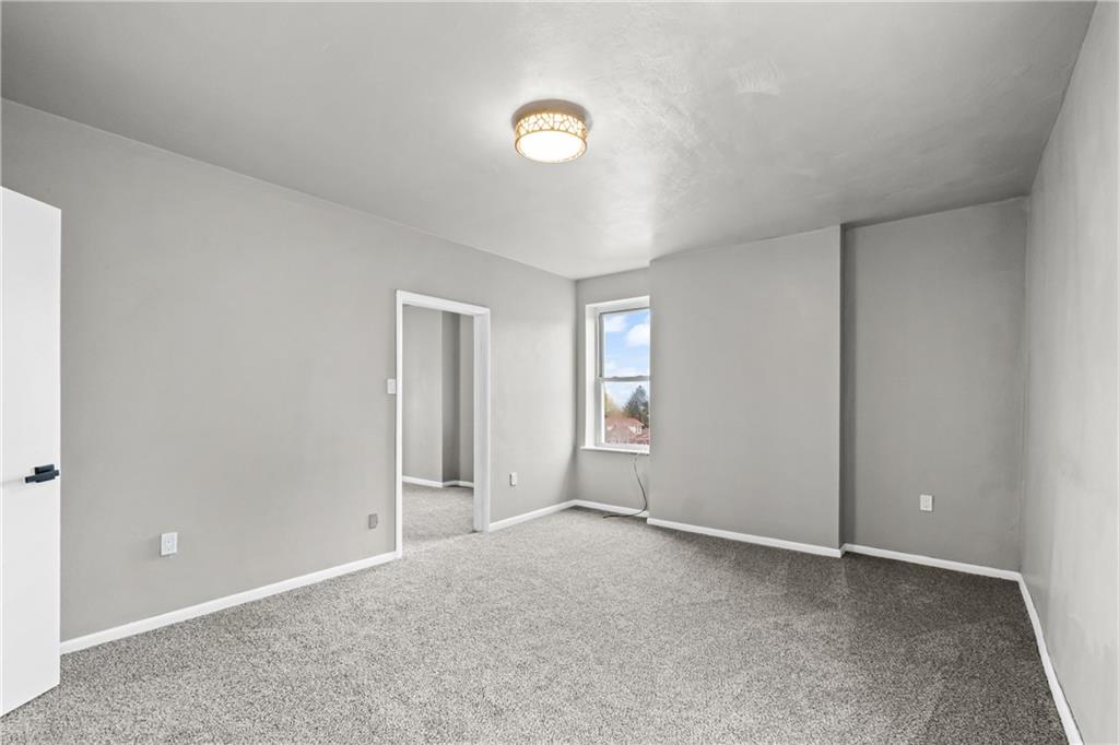 1256 Superior Avenue Pittsburgh, PA 15212 - Photo 49 of 50 an empty room with windows and closet