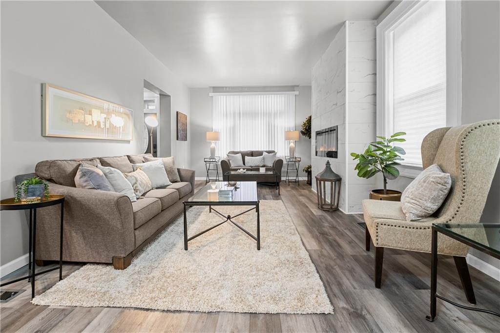 1256 Superior Avenue Pittsburgh, PA 15212 - Photo 7 of 50 a living room with furniture and a large window