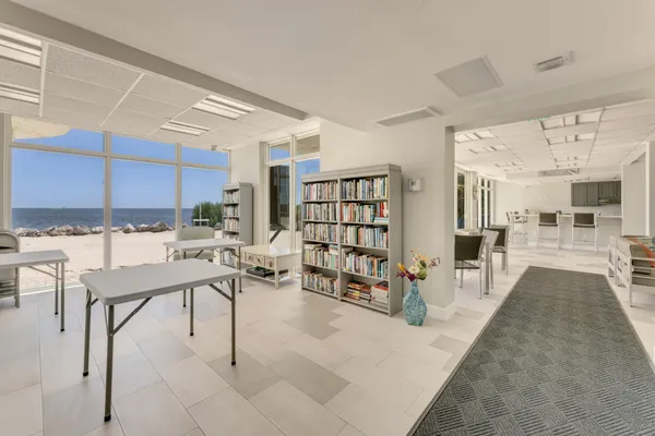 a room with furniture a table and chairs