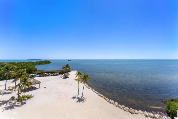 a view of a ocean with beach