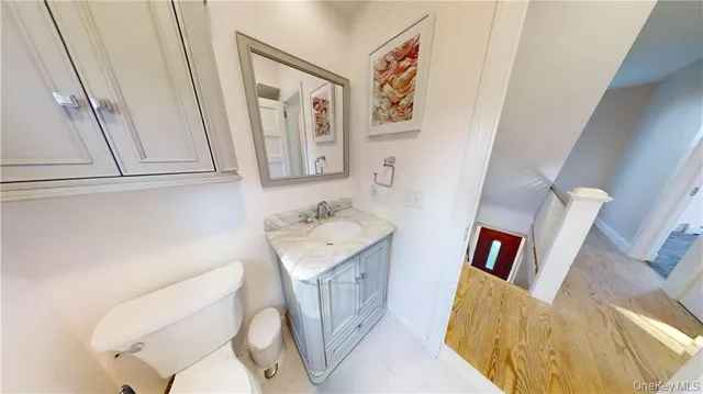 a bathroom with sink and mirror