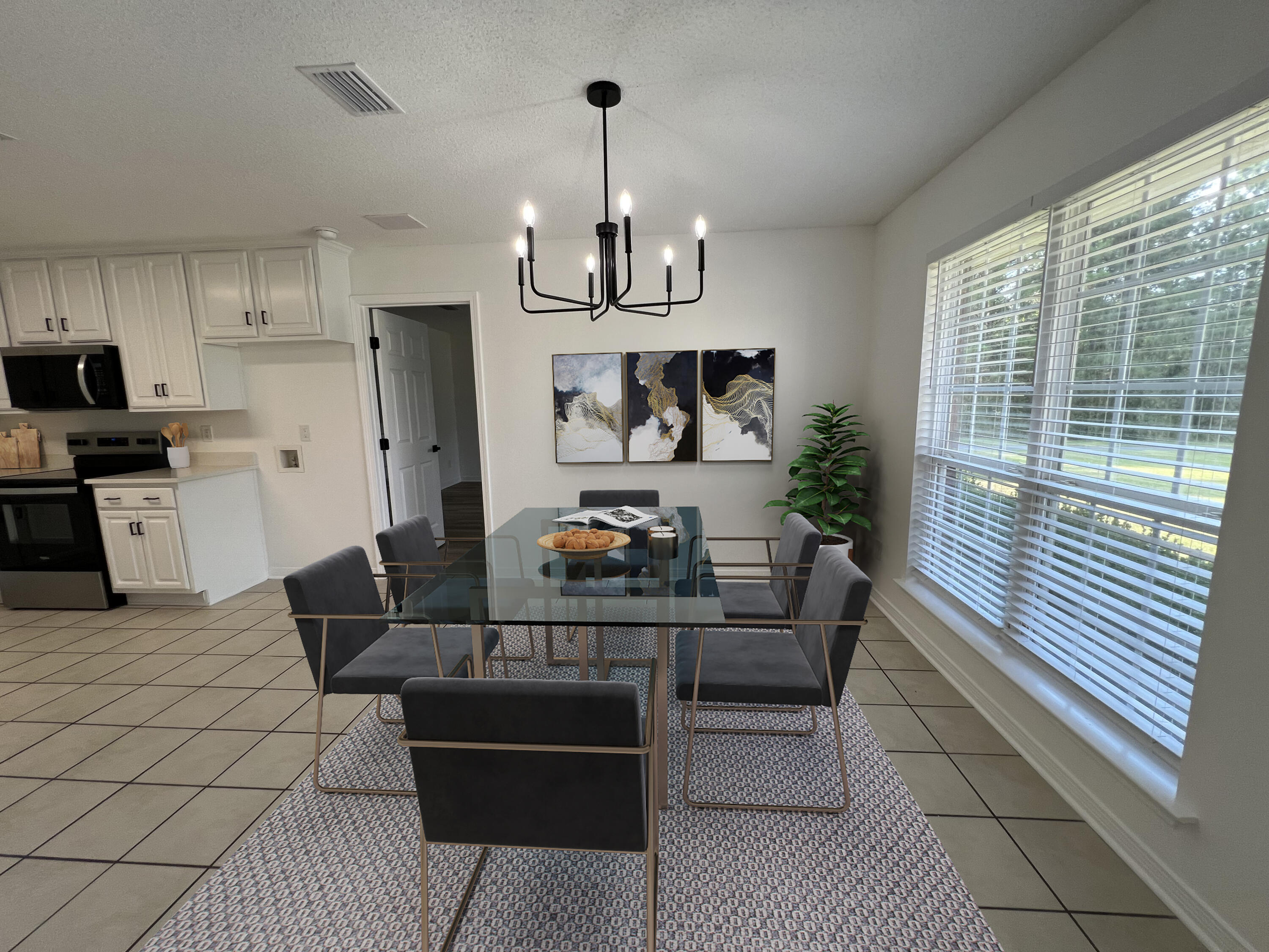 5330 John Lowery Road Jay, FL 32565 - Photo 13 of 30 a living room with furniture and a chandelier