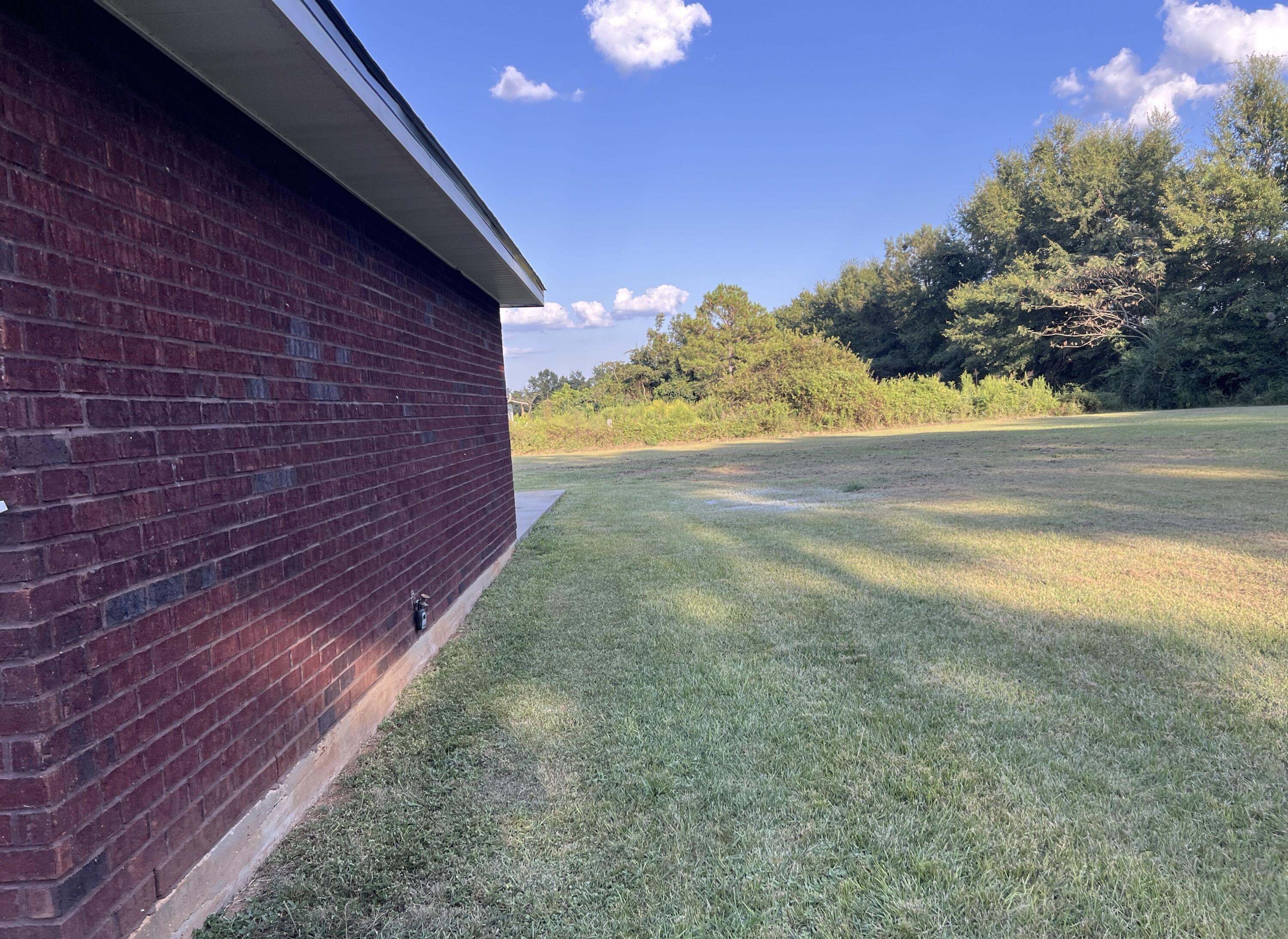 5330 John Lowery Road Jay, FL 32565 - Photo 29 of 30 a view of an empty room with a yard