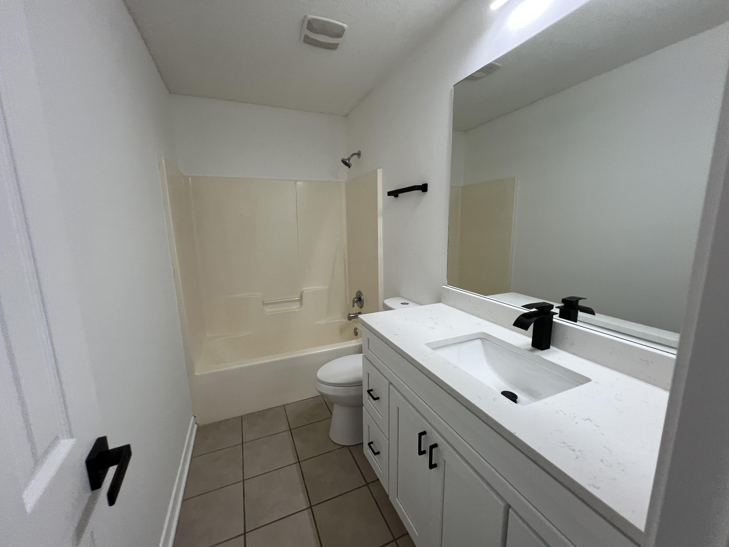 5330 John Lowery Road Jay, FL 32565 - Photo 4 of 30 a bathroom with a sink a toilet and shower