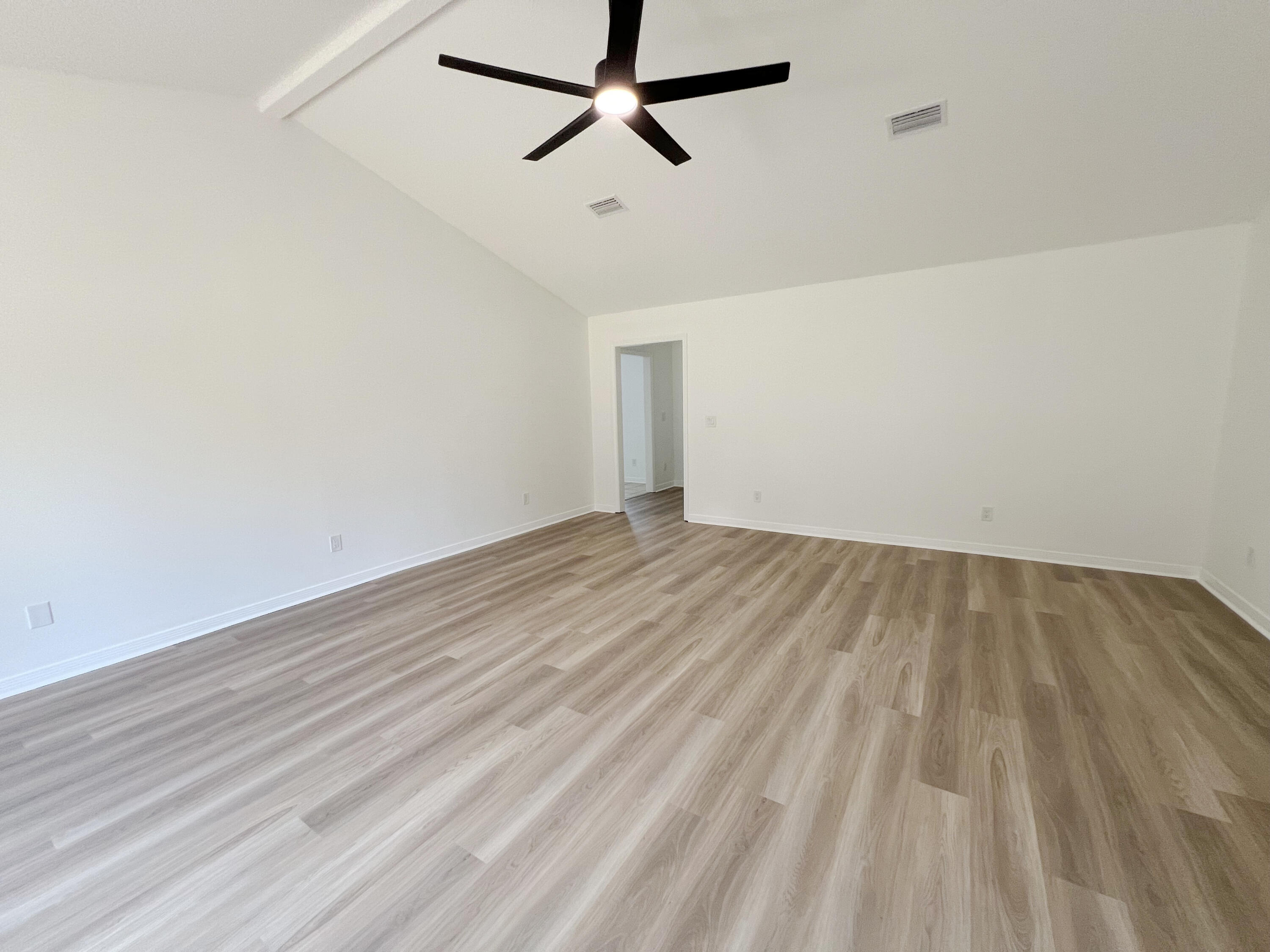 5330 John Lowery Road Jay, FL 32565 - Photo 10 of 30 wooden floor in a empty room