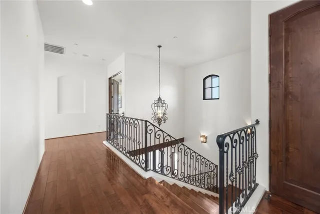 a bathroom with a sink toilet and mirror