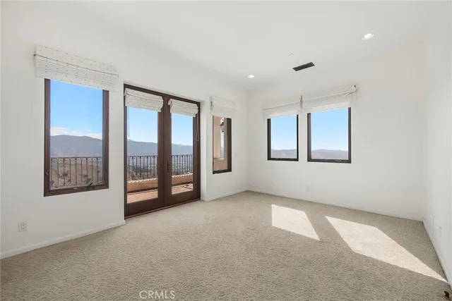 a view of balcony with furniture