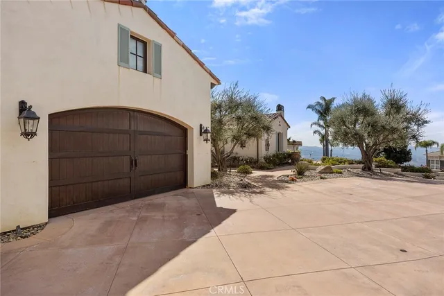 a view of a house with a snow in the yard