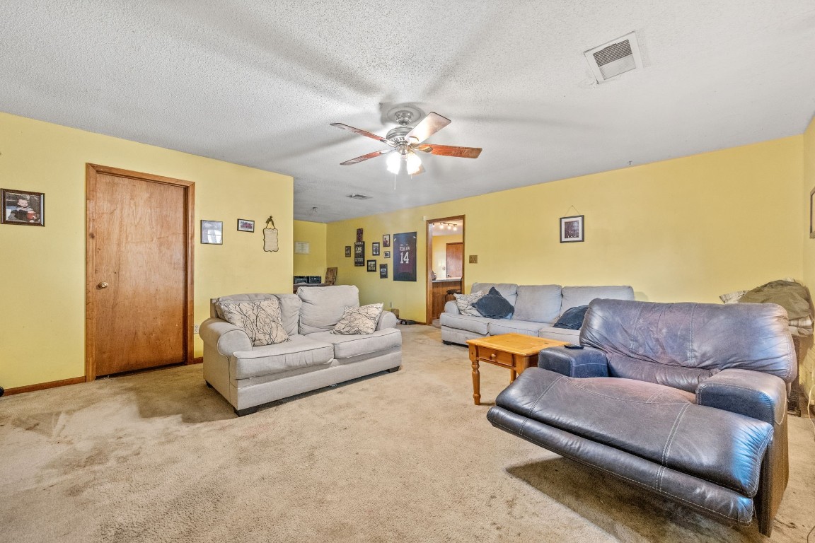 71 Shady Oaks Point Blank, TX 77364 - Photo 12 of 32 a living room with furniture and a couch