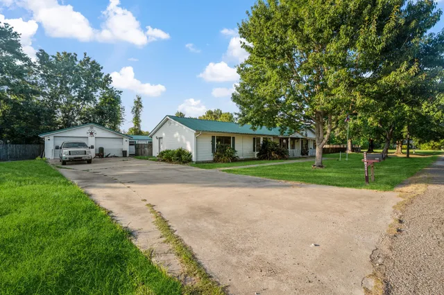 a house view with a garden space