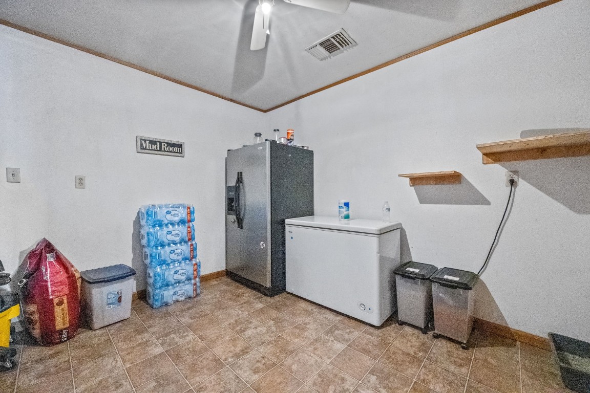 71 Shady Oaks Point Blank, TX 77364 - Photo 23 of 32 a room with storage and utility