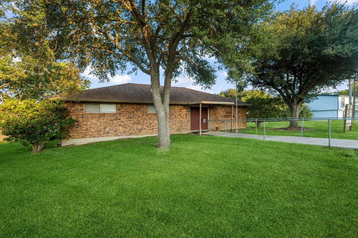 71 Shady Oaks Point Blank, TX 77364 - Photo 28 of 32 a view of a house with a yard