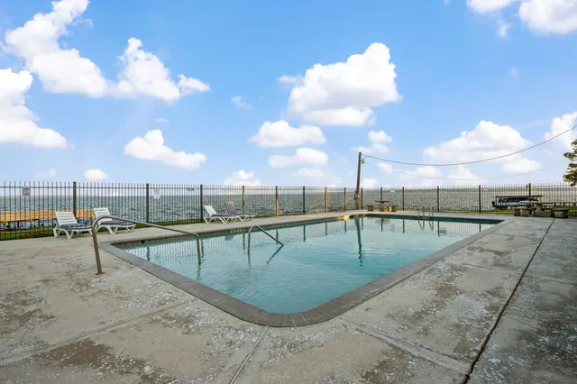 a view of outdoor space with swimming pool