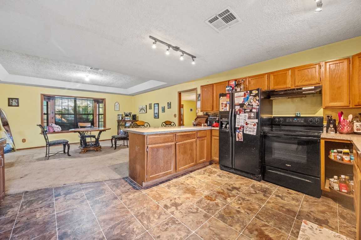71 Shady Oaks Point Blank, TX 77364 - Photo 8 of 32 a view of a kitchen with furniture and window