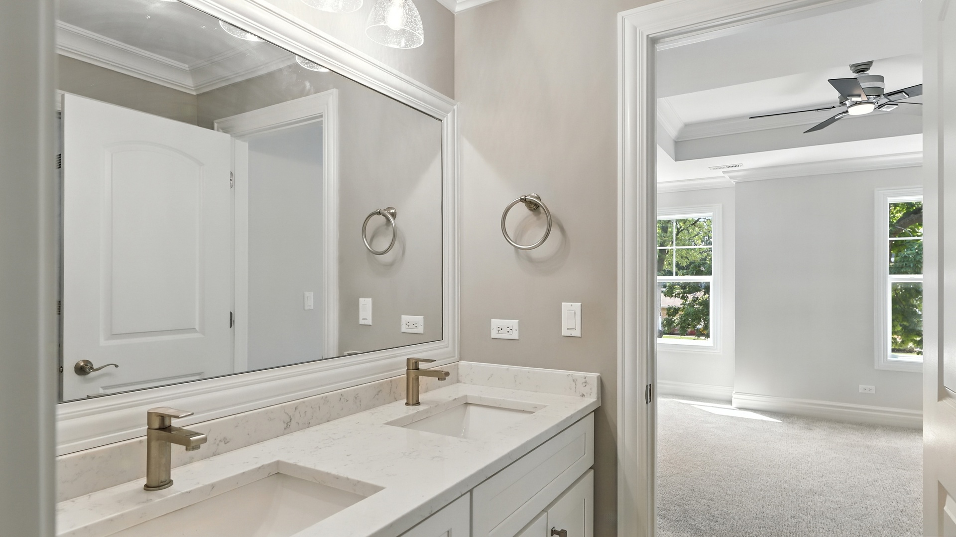 1127 Kenton Road Deerfield, IL 60015 - Photo 23 of 35 a bathroom with a sink and a mirror