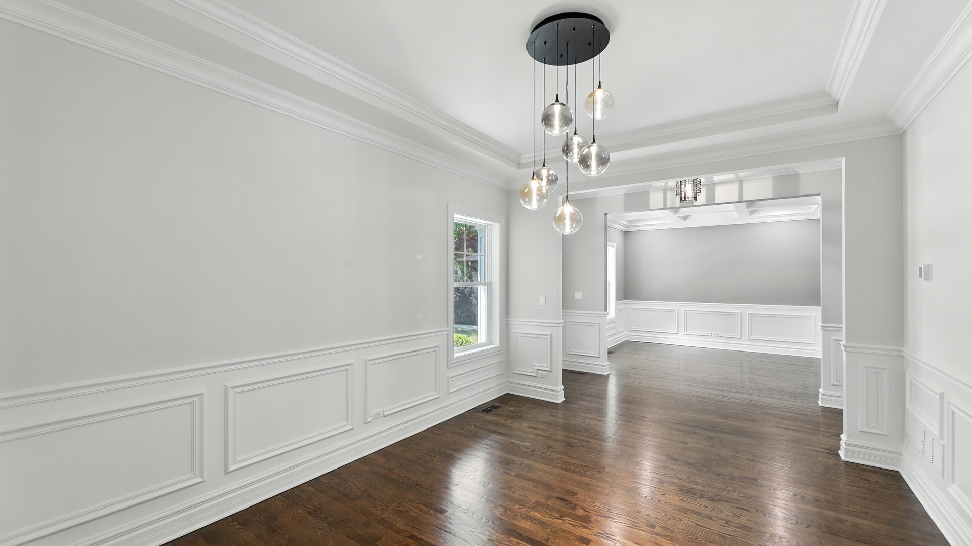 1127 Kenton Road Deerfield, IL 60015 - Photo 7 of 35 a view of livingroom with hardwood floor and kitchen view