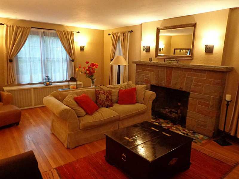 508 Bevington Road Forest Hills, PA 15221 - Photo 6 of 25 Living Room. The Living Room is on the left side of the home. It has a fireplace and leads to the Sunroom and two other rooms.