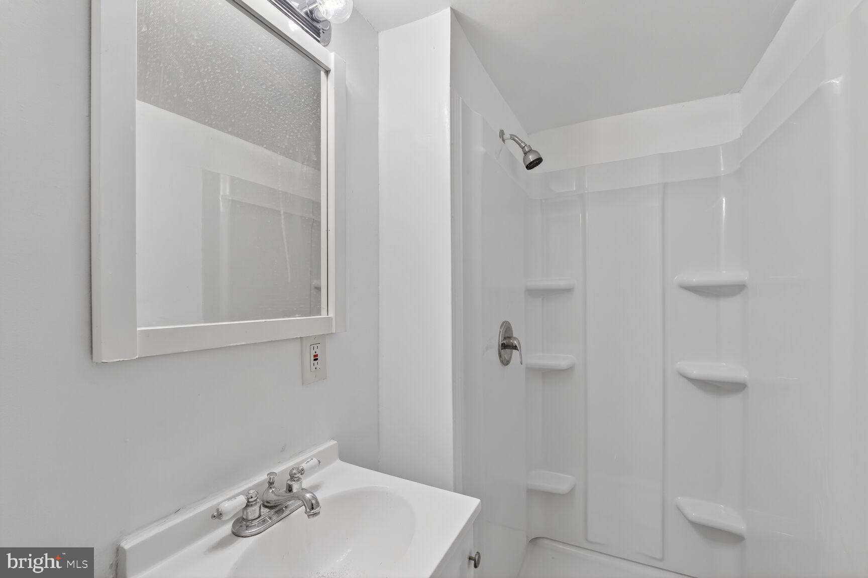 632 Franklin Street Northeast Washington, DC 20017 - Photo 13 of 19 Modern bathroom with sleek, clean lines.