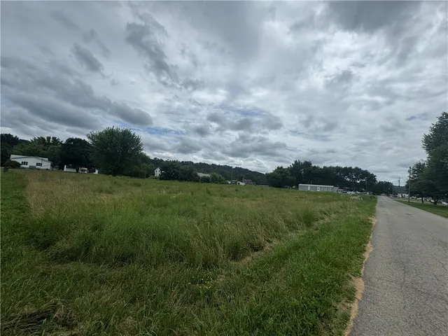 a view of a lake with a big yard