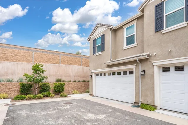 a view of a small white house