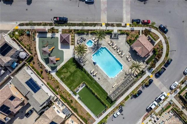 an aerial view of a house with a garden