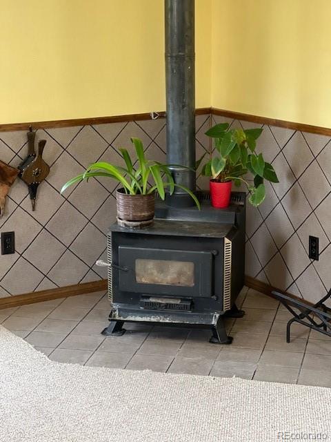 1493 Flintwood Road Franktown, CO 80116 - Photo 23 of 31 a stove top oven sitting next to a road