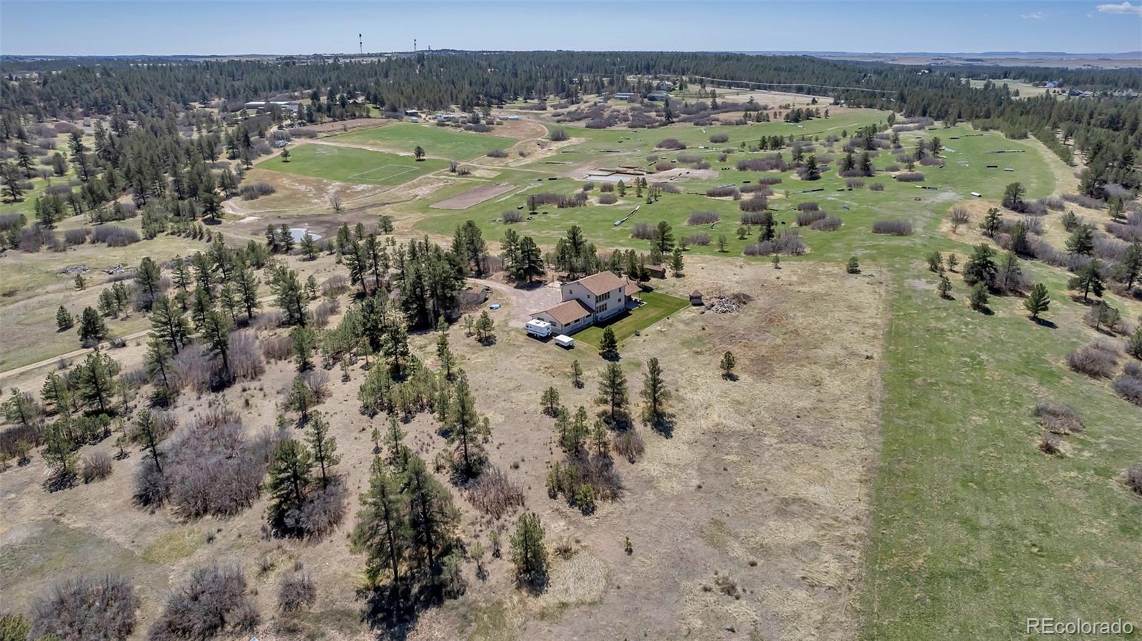 1493 Flintwood Road Franktown, CO 80116 - Photo 3 of 31 a view of a city