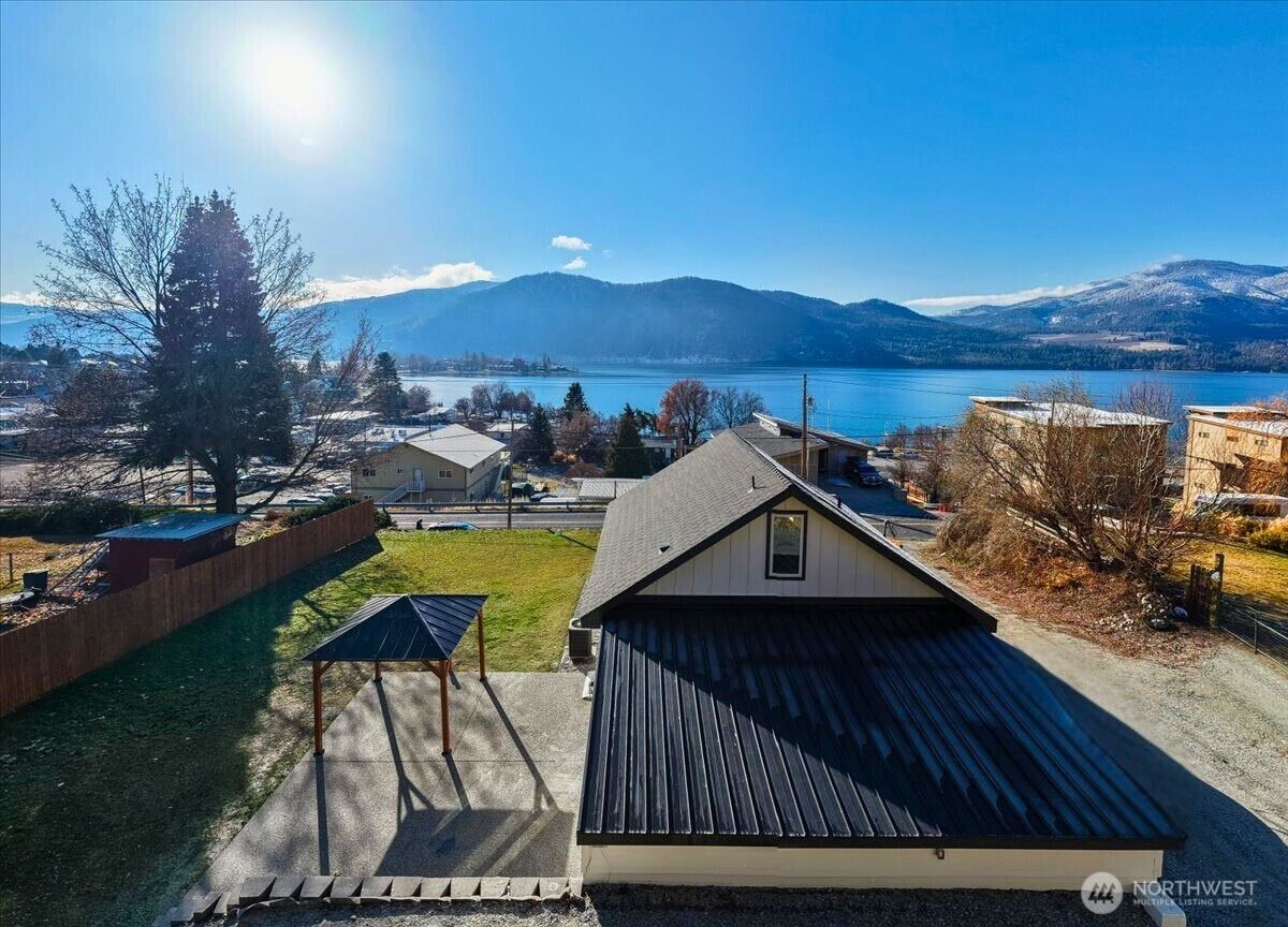 124 Boetzke Avenue Manson, WA 98831 - Photo 2 of 36 a view of a house with pool and sitting area