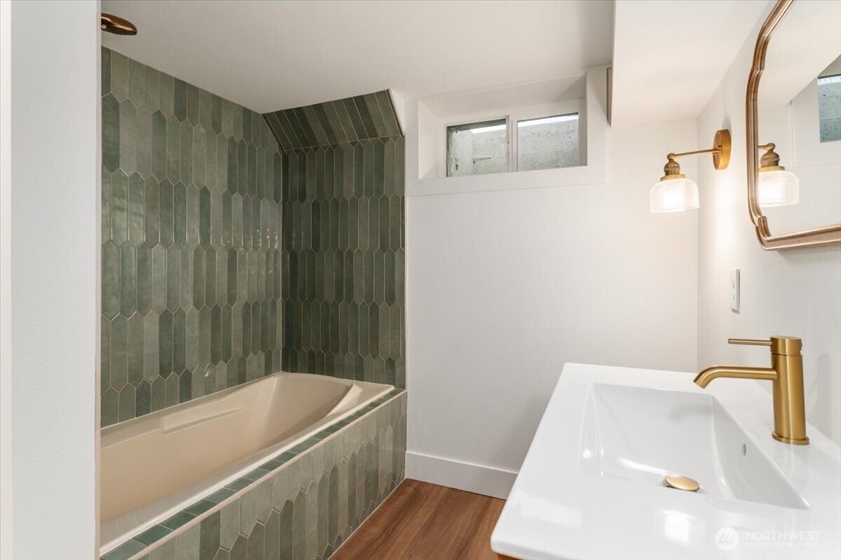 124 Boetzke Avenue Manson, WA 98831 - Photo 30 of 36 a bathroom with a tub and sink