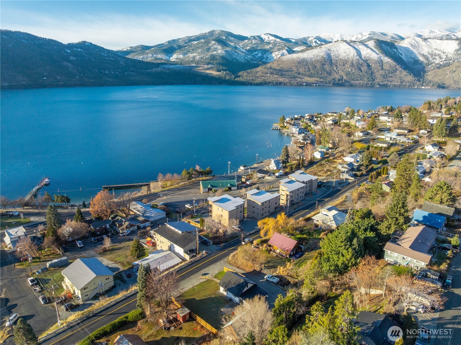 124 Boetzke Avenue Manson, WA 98831 - Photo 35 of 36 an aerial view of a houses with a lake view