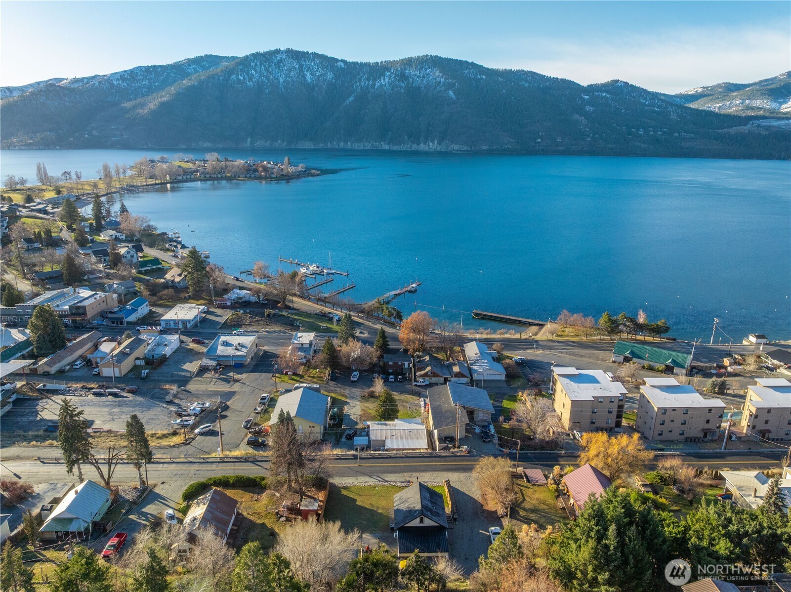 124 Boetzke Avenue Manson, WA 98831 - Photo 36 of 36 a view of a lake with a mountain