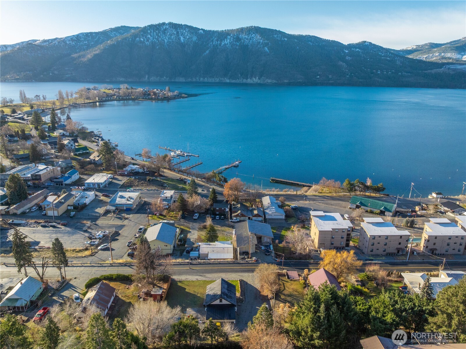 124 Boetzke Avenue Manson, WA 98831 - Photo 5 of 36 a view of a lake with a mountain