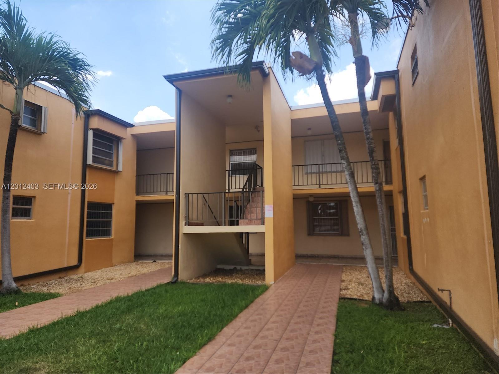 8990 Southwest 24th Street, Unit 19 Miami, FL 33165 - Photo 1 of 16 a view of front door of house