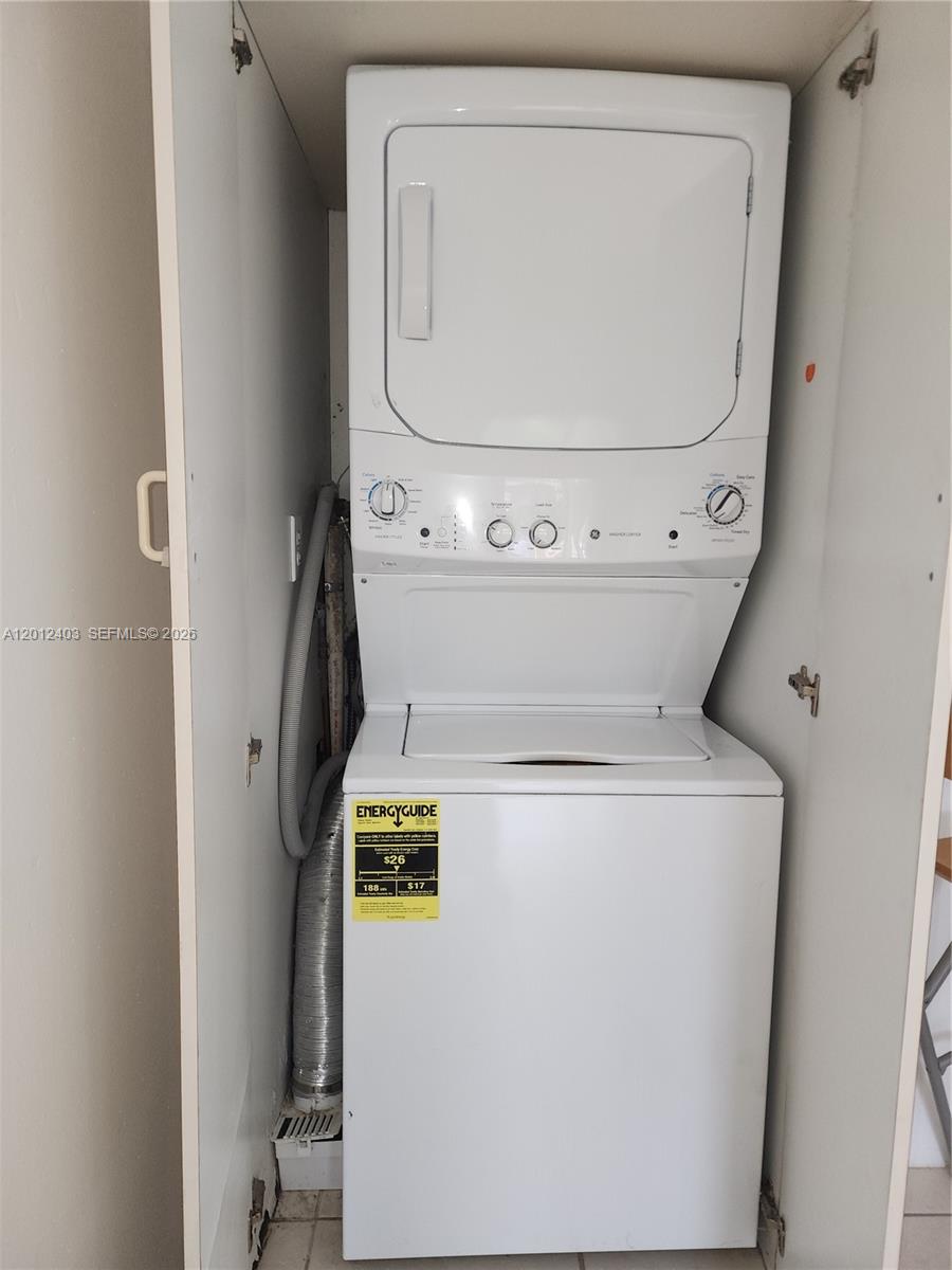 8990 Southwest 24th Street, Unit 19 Miami, FL 33165 - Photo 16 of 16 a utility room with dryer and washer