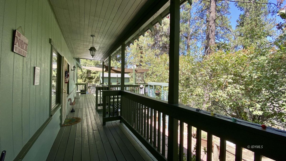 52905 Tollgate Road Idyllwild, CA 92549 - Photo 3 of 91 a view of a balcony with wooden floor