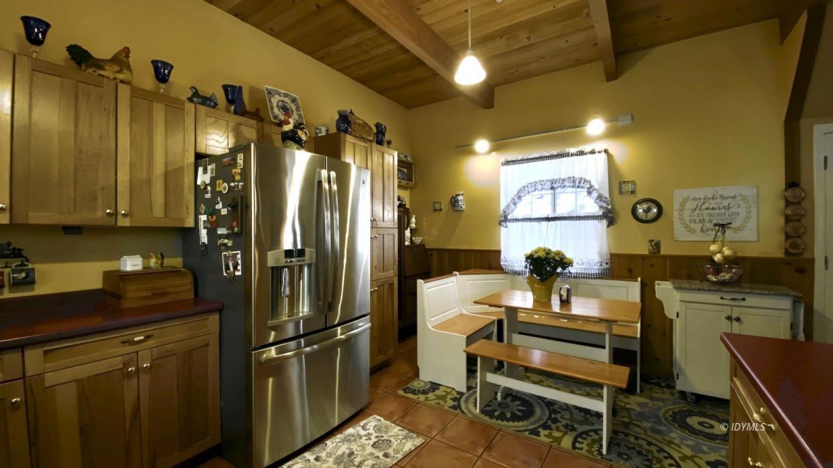 52905 Tollgate Road Idyllwild, CA 92549 - Photo 36 of 91 a kitchen with a refrigerator and a sink