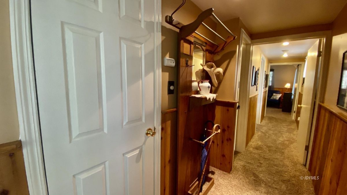 52905 Tollgate Road Idyllwild, CA 92549 - Photo 38 of 91 a view of a hallway with closet and furniture