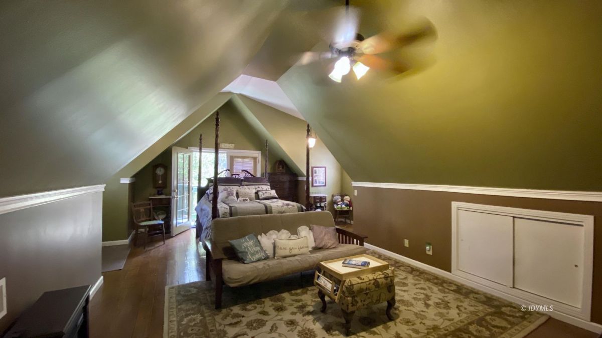 52905 Tollgate Road Idyllwild, CA 92549 - Photo 4 of 91 a living room with furniture and a chandelier