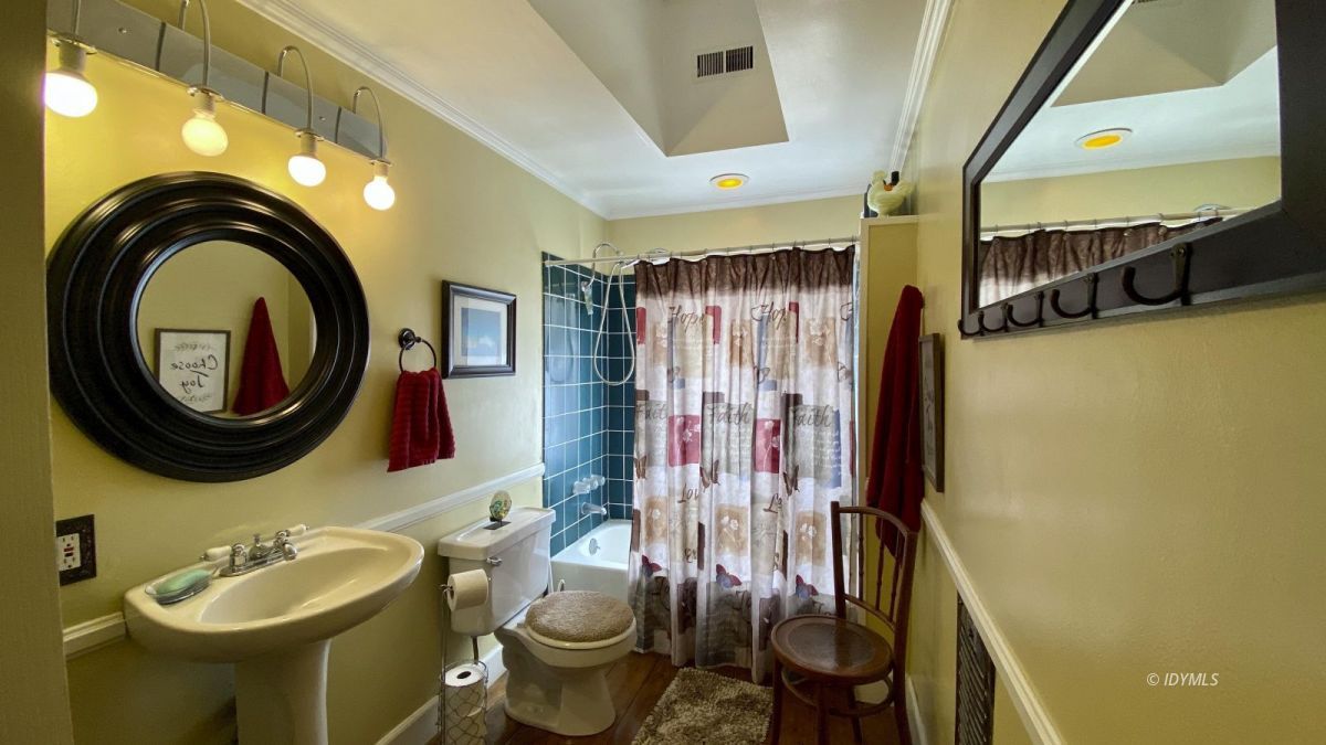 52905 Tollgate Road Idyllwild, CA 92549 - Photo 42 of 91 a bathroom with a sink and a mirror