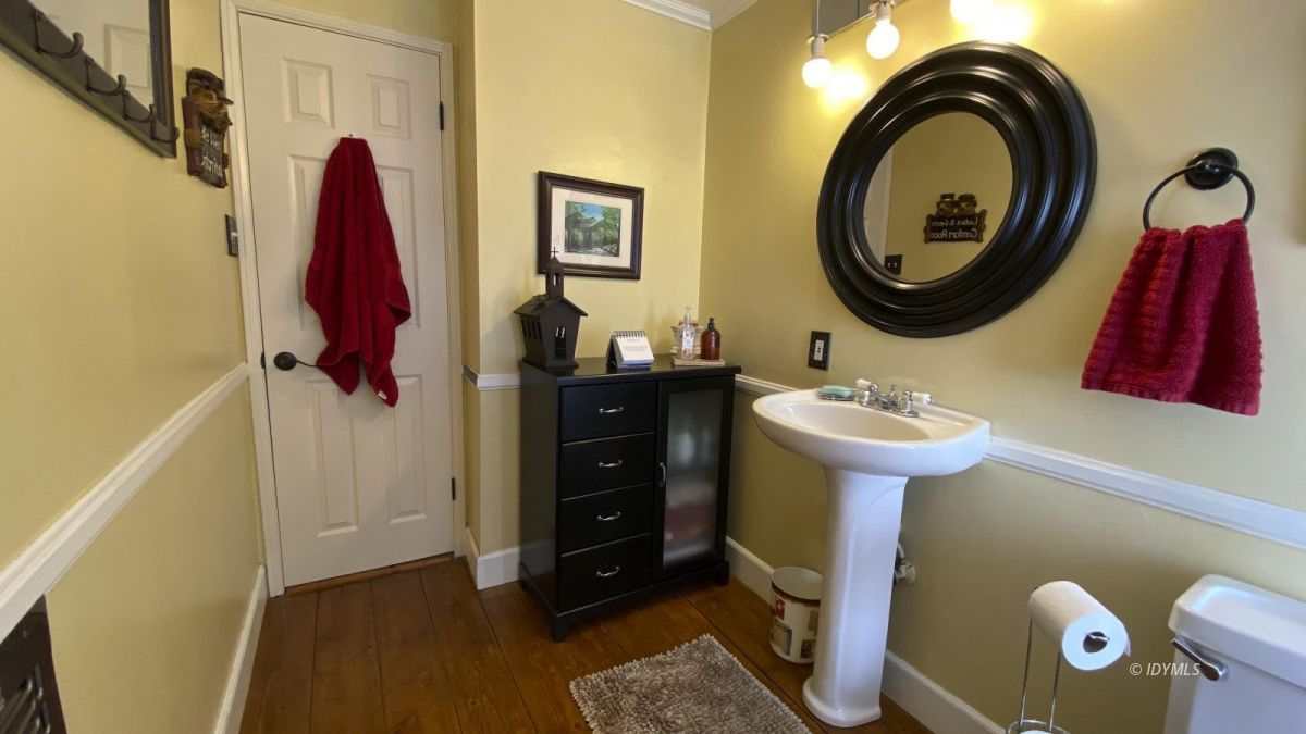 52905 Tollgate Road Idyllwild, CA 92549 - Photo 43 of 91 a bathroom with a sink and a mirror