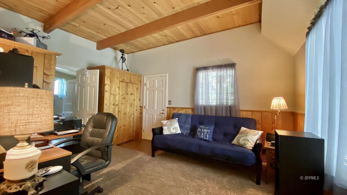 52905 Tollgate Road Idyllwild, CA 92549 - Photo 50 of 91 a living room with furniture and a flat screen tv