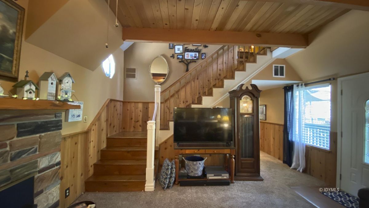 52905 Tollgate Road Idyllwild, CA 92549 - Photo 59 of 91 a view of a hallway with entryway wooden floor and front door