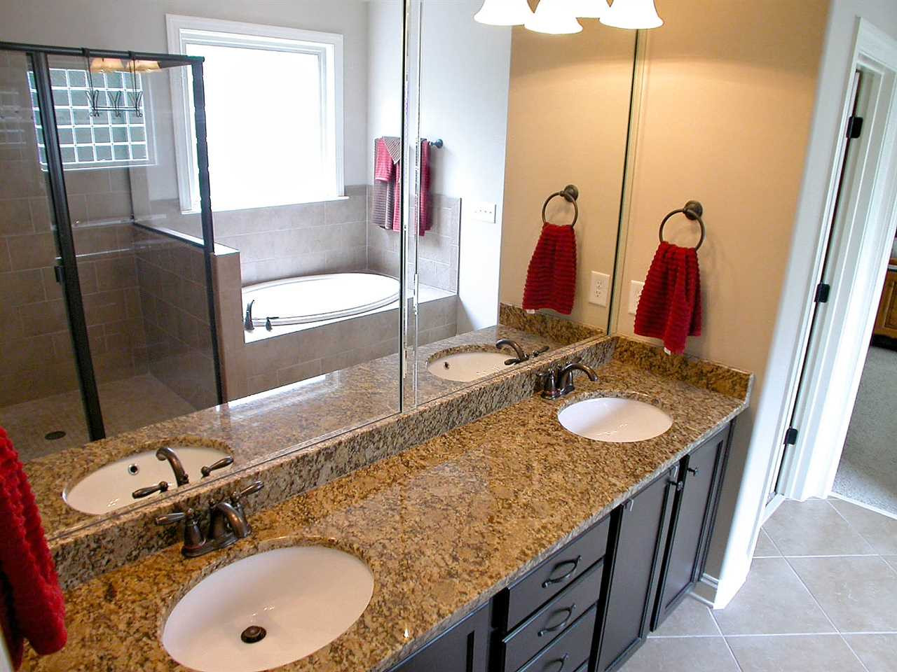 12349 Beestone Lane Raleigh, NC 27614 - Photo 12 of 25 Luxury bath with granite counter top vanity, oversized tile shower & garden tub. Master Bath/Spa