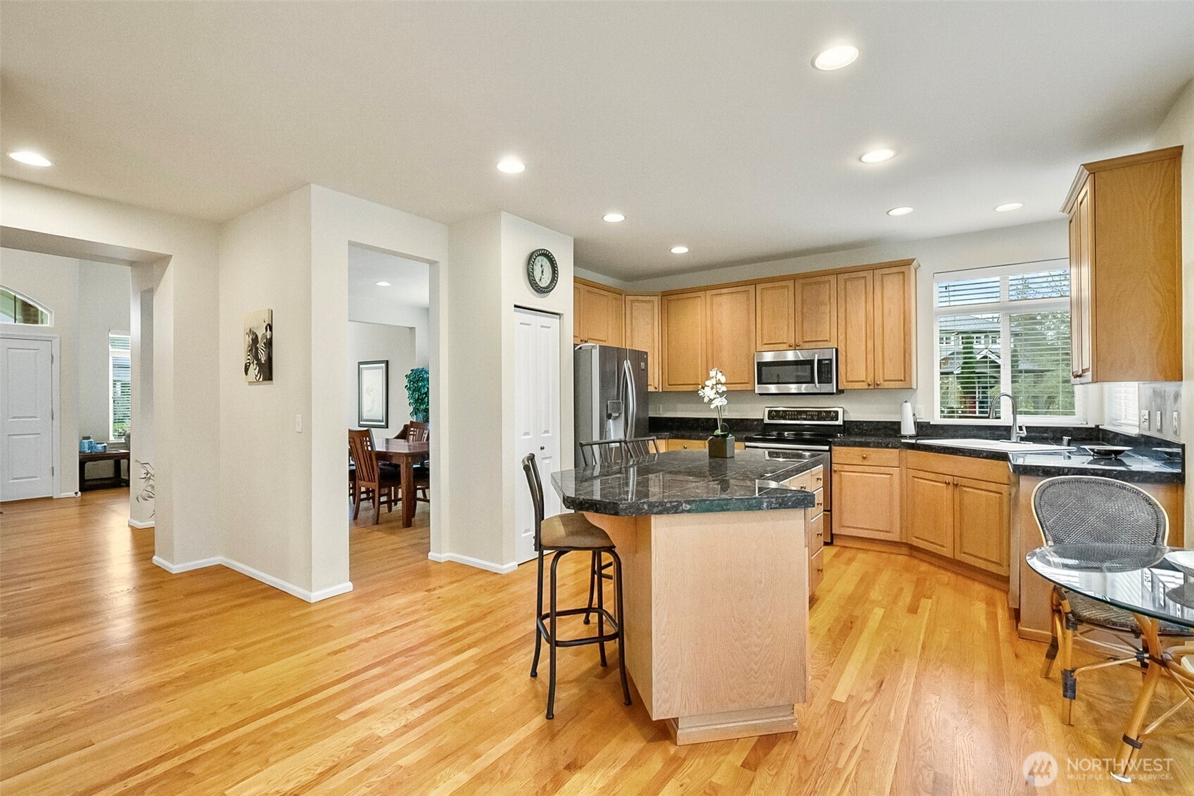 17401 33rd Drive Southeast Bothell, WA 98012 - Photo 16 of 39 a kitchen with stainless steel appliances granite countertop a refrigerator a stove top oven and a sink