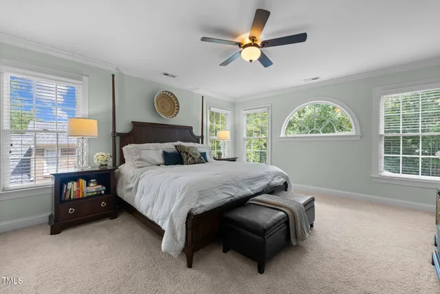 a dining room with furniture window and wooden floor