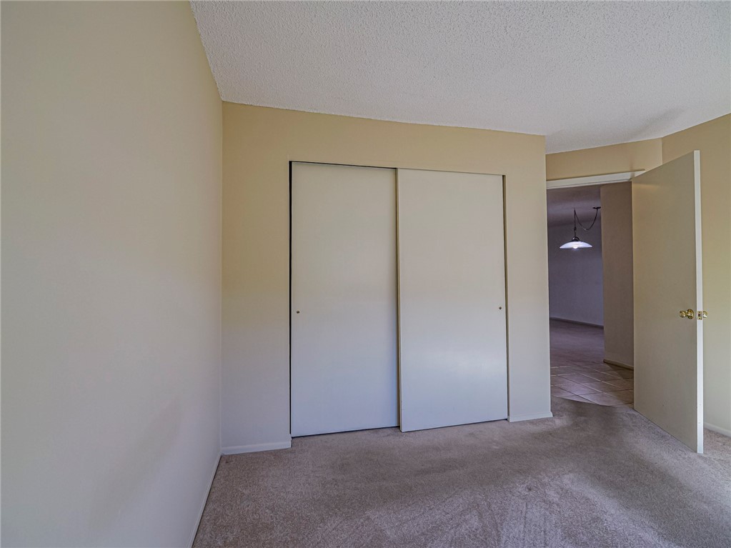 6006 Indrio Road, Unit B4 Fort Pierce, FL 34951 - Photo 24 of 36 an empty room with closet