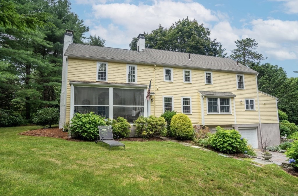 217 Conant Road Weston, MA 02493 - Photo 28 of 30 a front view of a house with garden