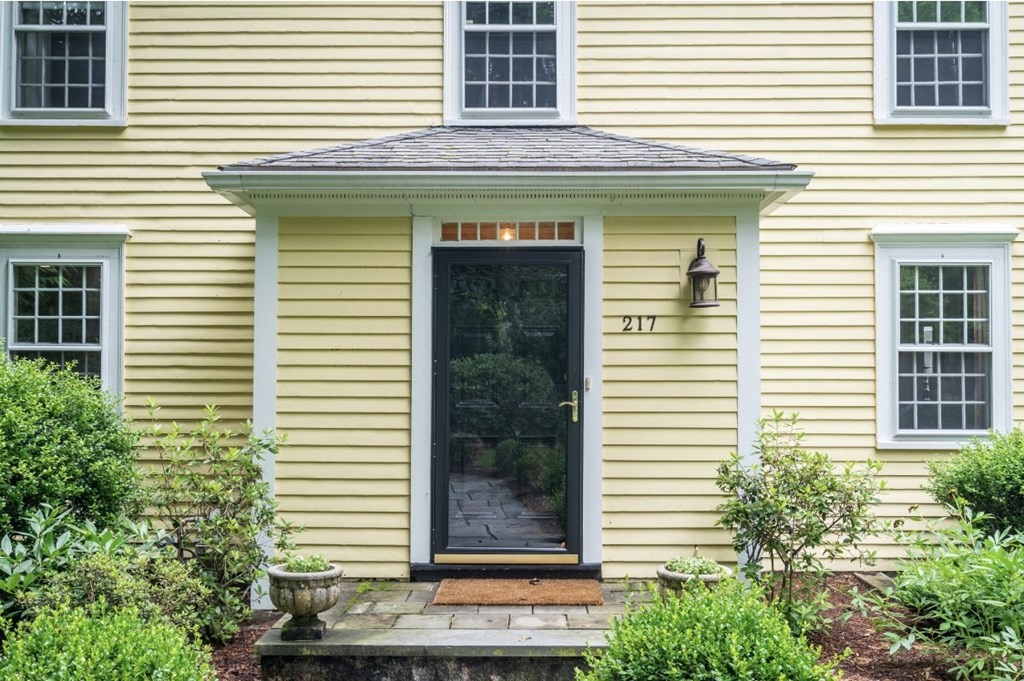 217 Conant Road Weston, MA 02493 - Photo 3 of 30 a view of a windows in back of the house