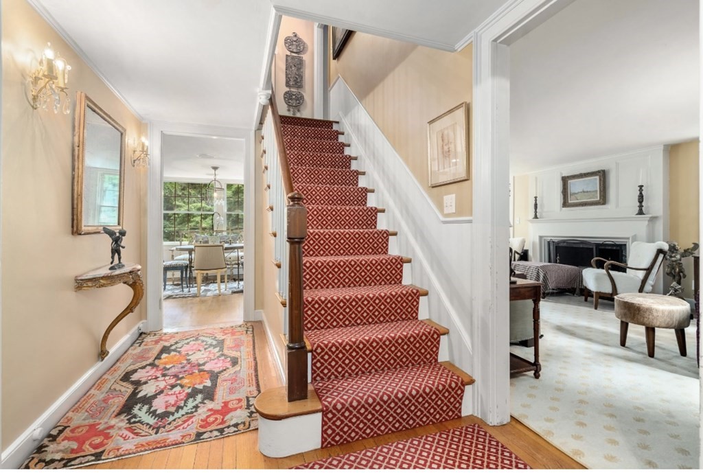 217 Conant Road Weston, MA 02493 - Photo 4 of 30 a living room with furniture and a rug